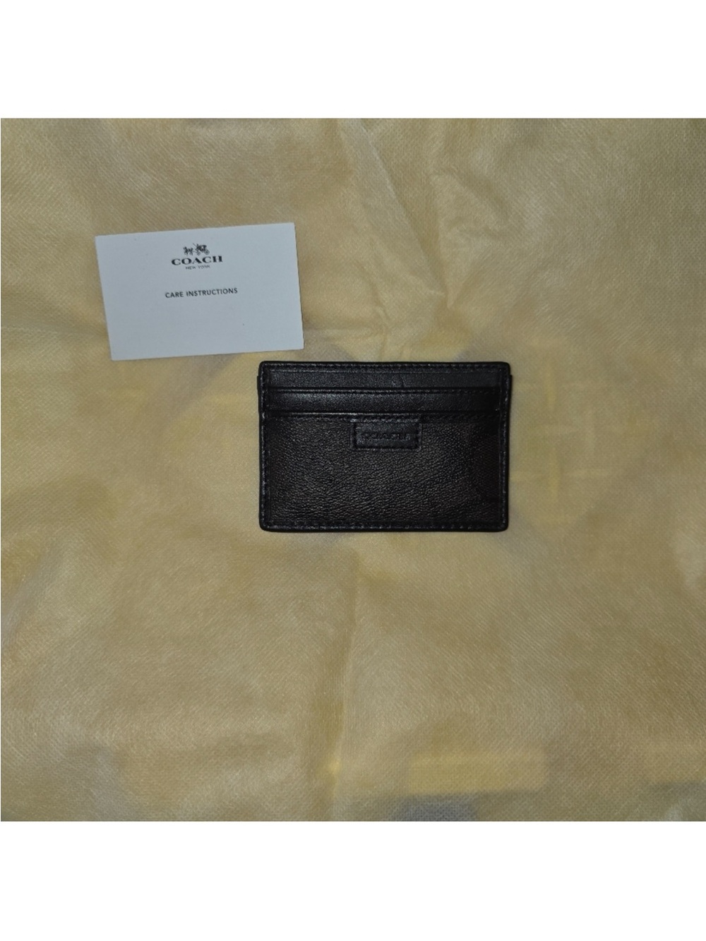 NWOT Coach Brown Leather Slim
Card Holder With Care Card.